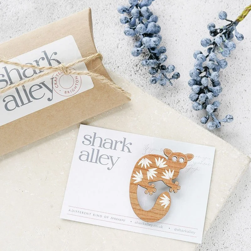 Shark_Alley_White_Painted_Bushbaby_Brooch_grande.jpg