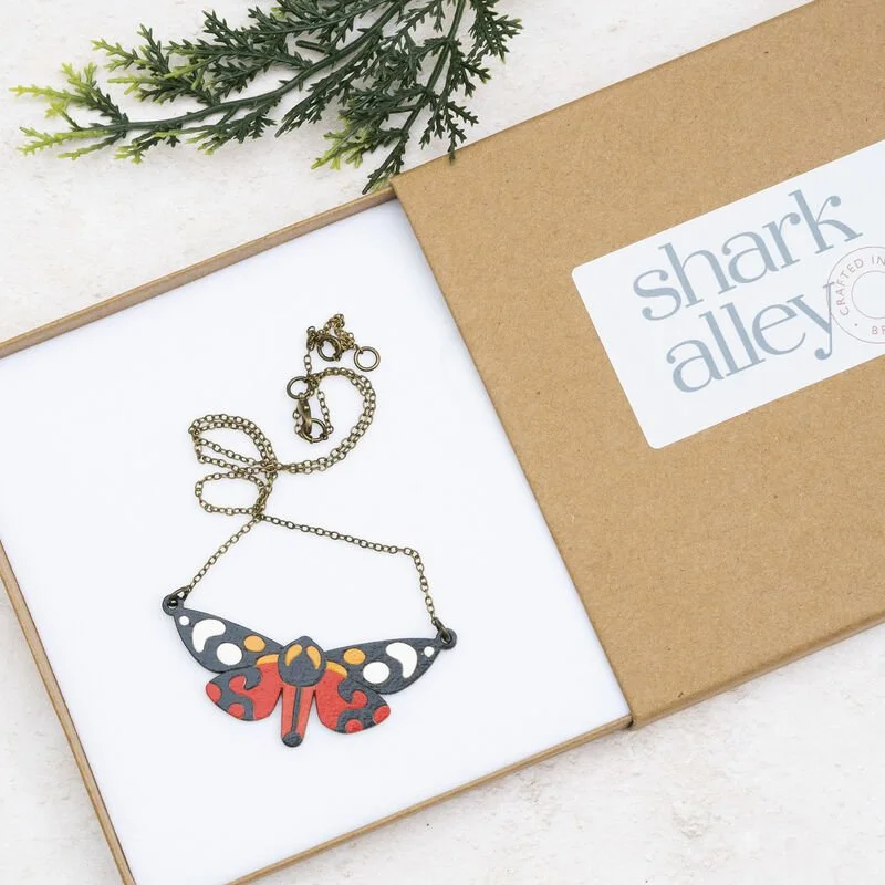 Shark_Alley_Scarlet_Tiger_Moth_Necklace_grande.jpg