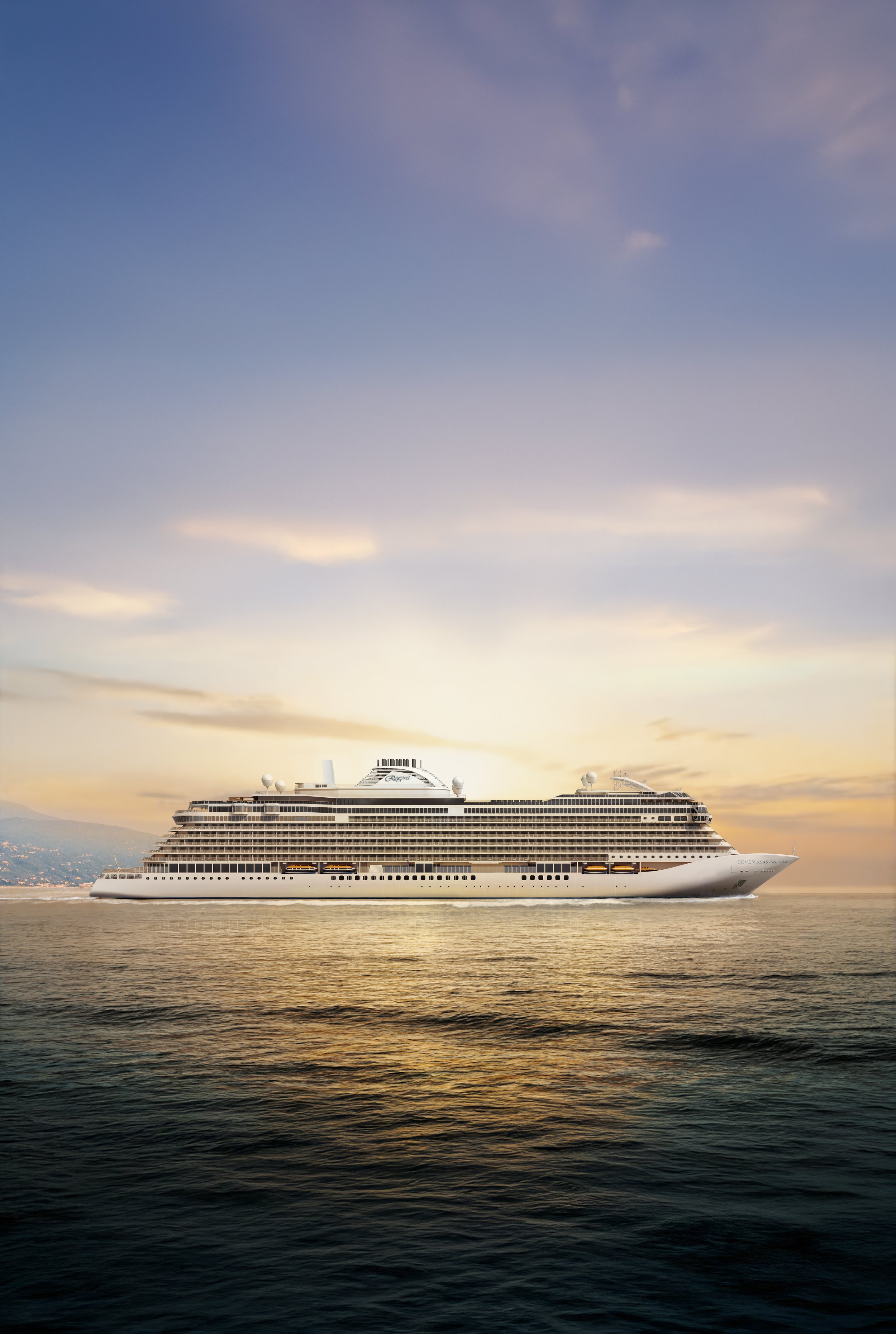 A large white cruise ship sailing on calm waters during sunset or sunrise with a partly cloudy sky in the background.