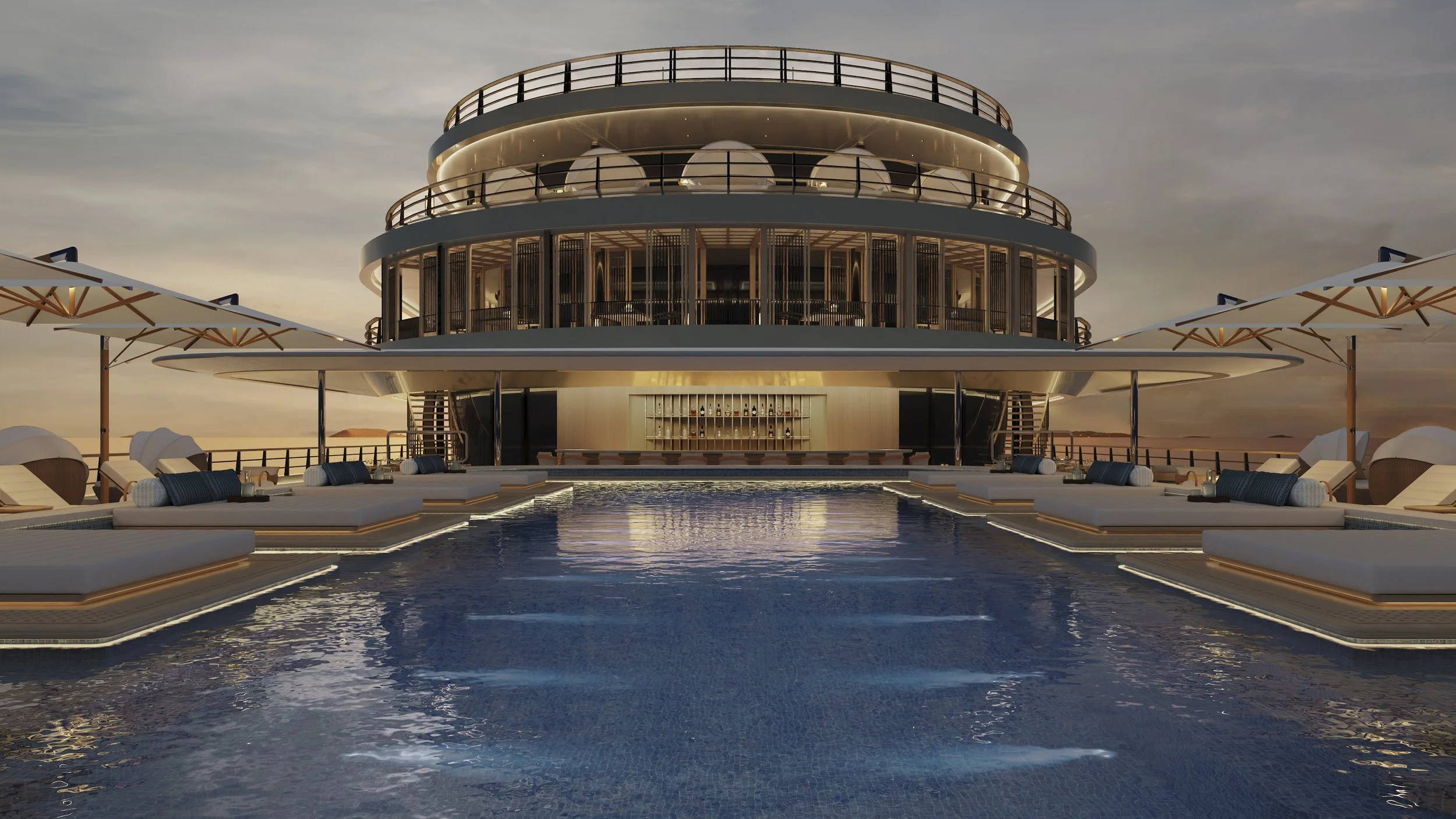 An elegant, modern rooftop pool area at sunset with a large, circular multi-level building in the background, surrounded by lounge chairs and umbrellas.