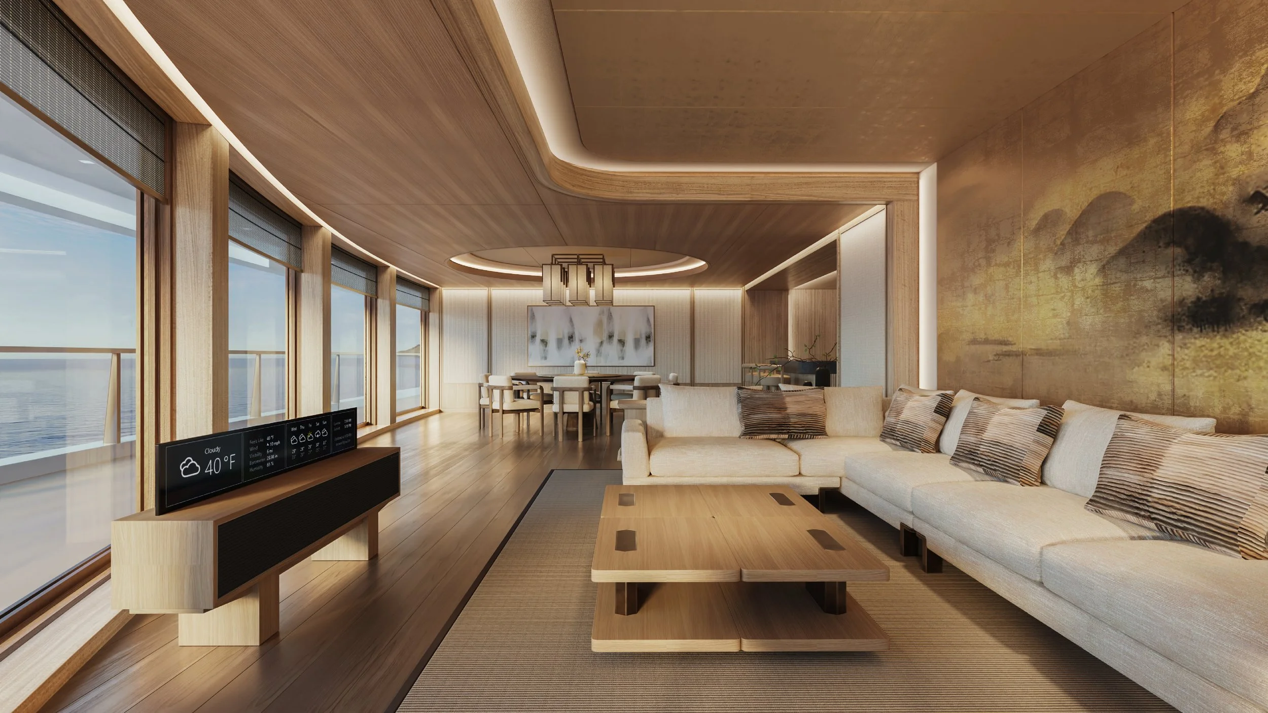 Modern living room with large windows overlooking water, beige sofa with striped pillows, wooden coffee table, abstract artwork, and dining area with chandelier.