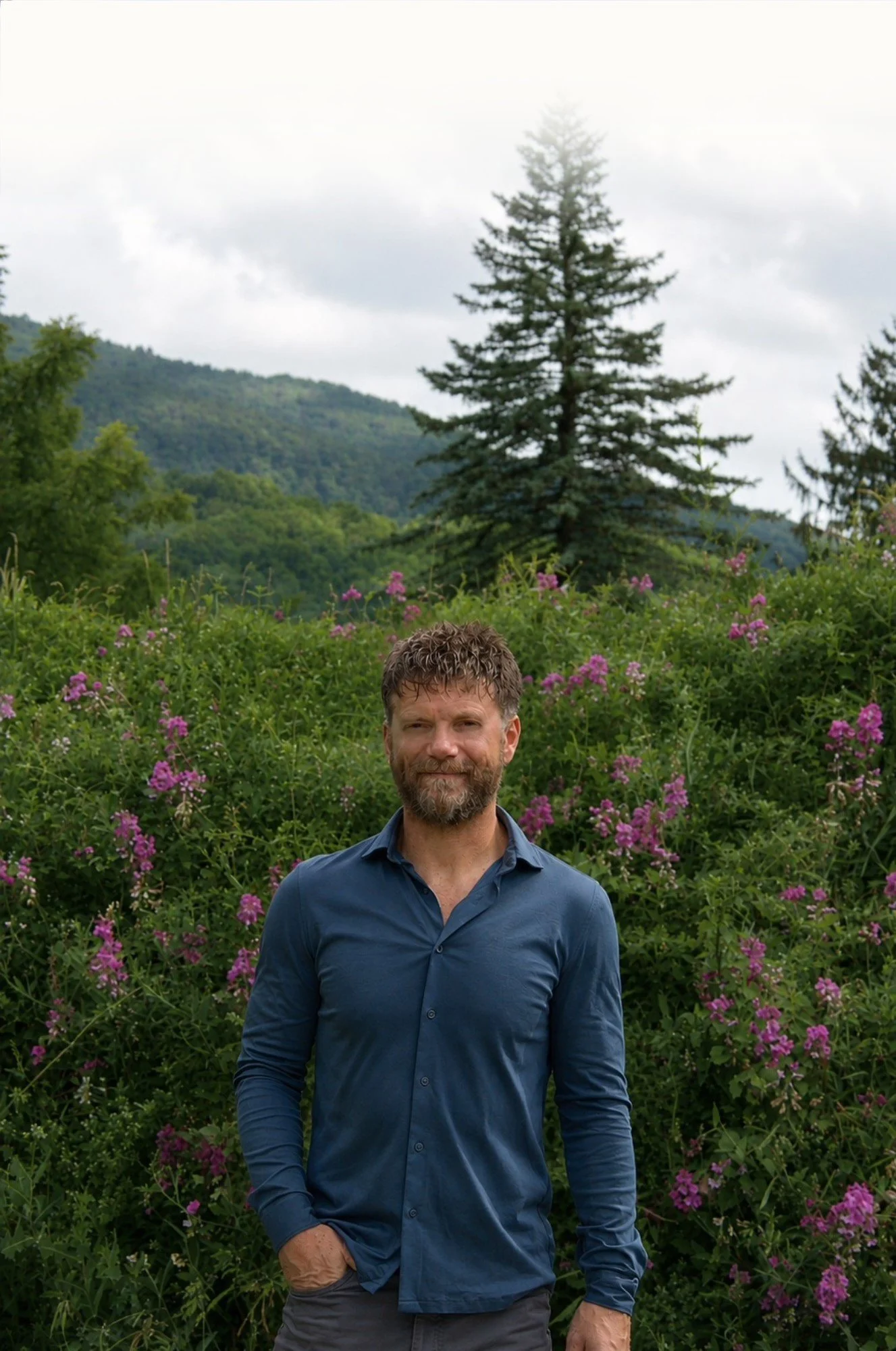 Dr. Charlie Roach outdoors, reflecting Root & Branch's philosophy of combining nature, science, and personalized healthcare.
