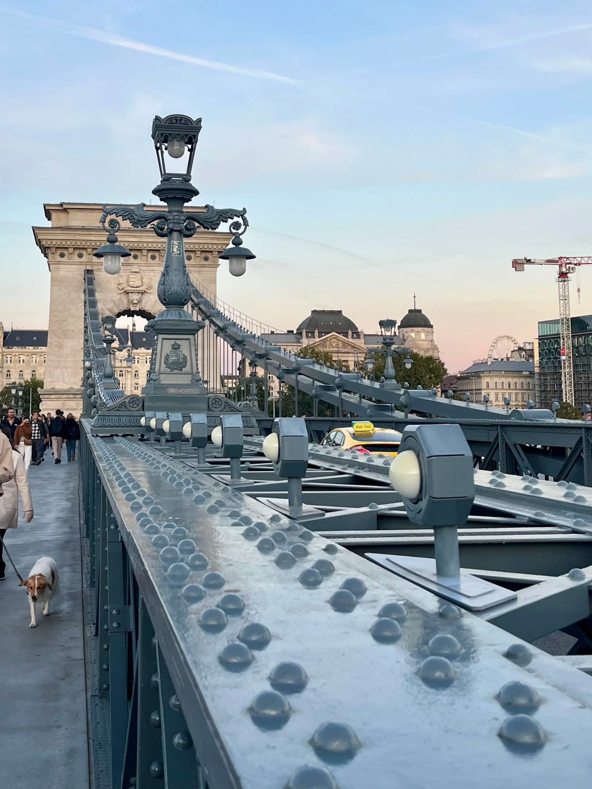 Bridge in Budapest with pedestrians walking