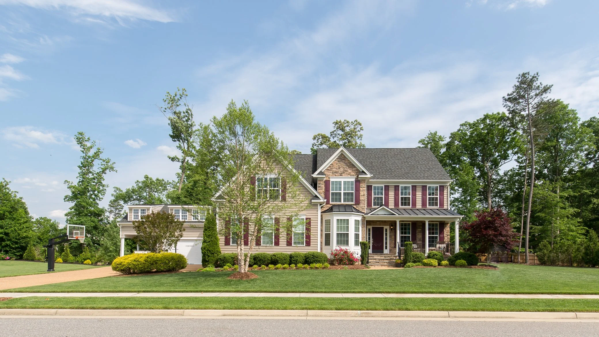 Image of the exterior of 3613 Stone Harbor, bought by a client of Tracy Kerzanet.