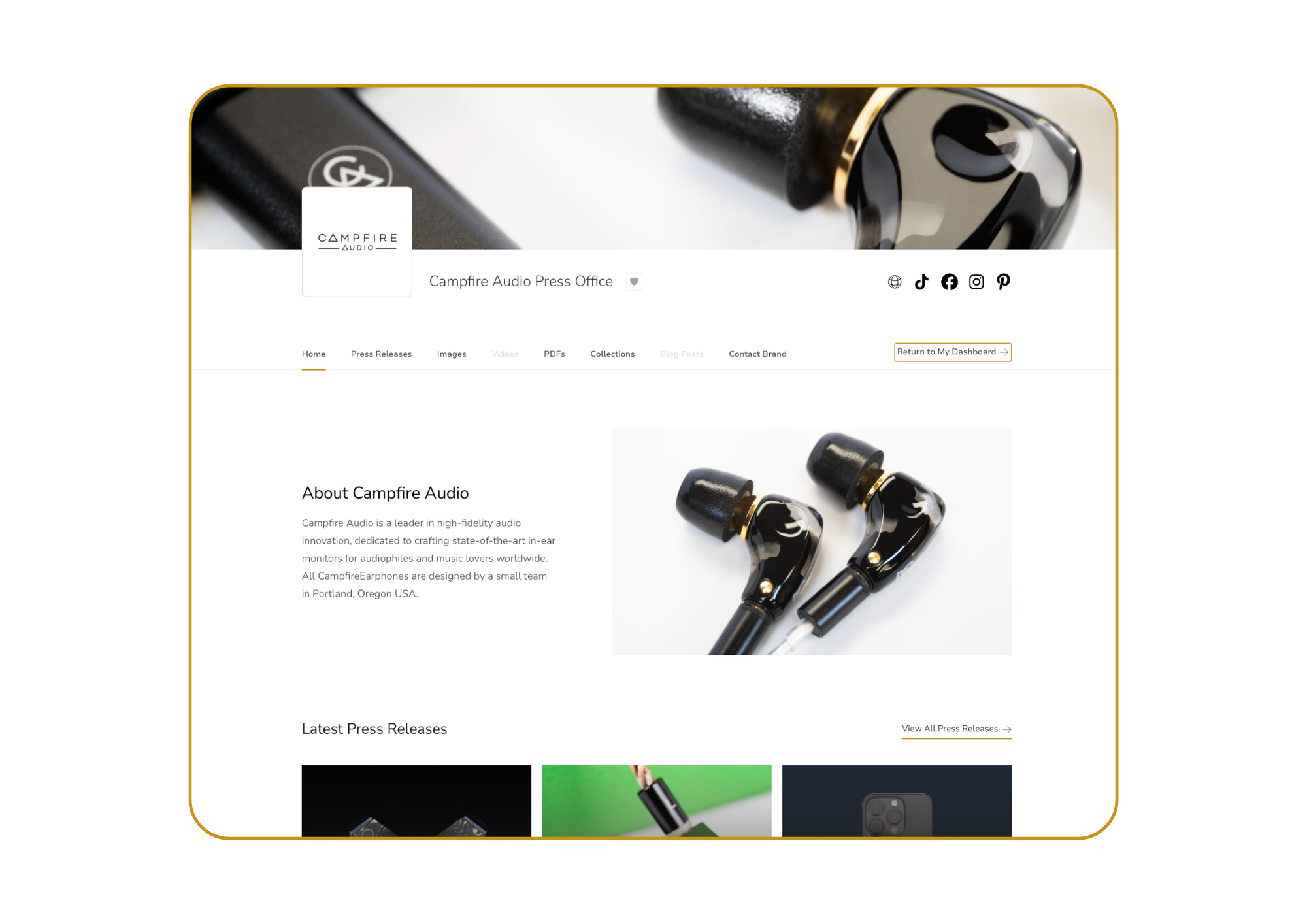 Close-up of black in-ear monitors with gold accents on a webpage header for Campfire Audio