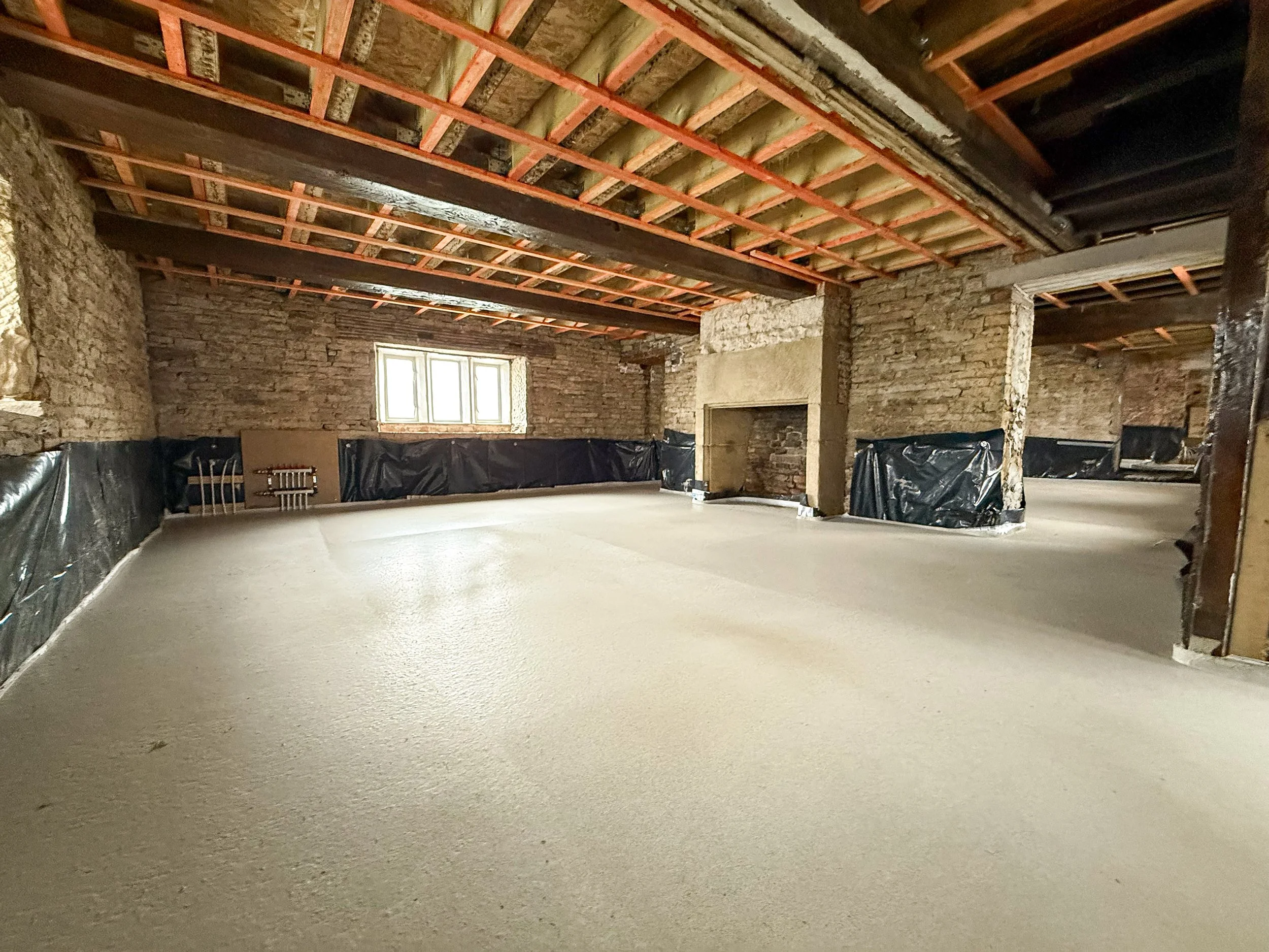Internal structural alterations creating open-plan living space within a traditional property.