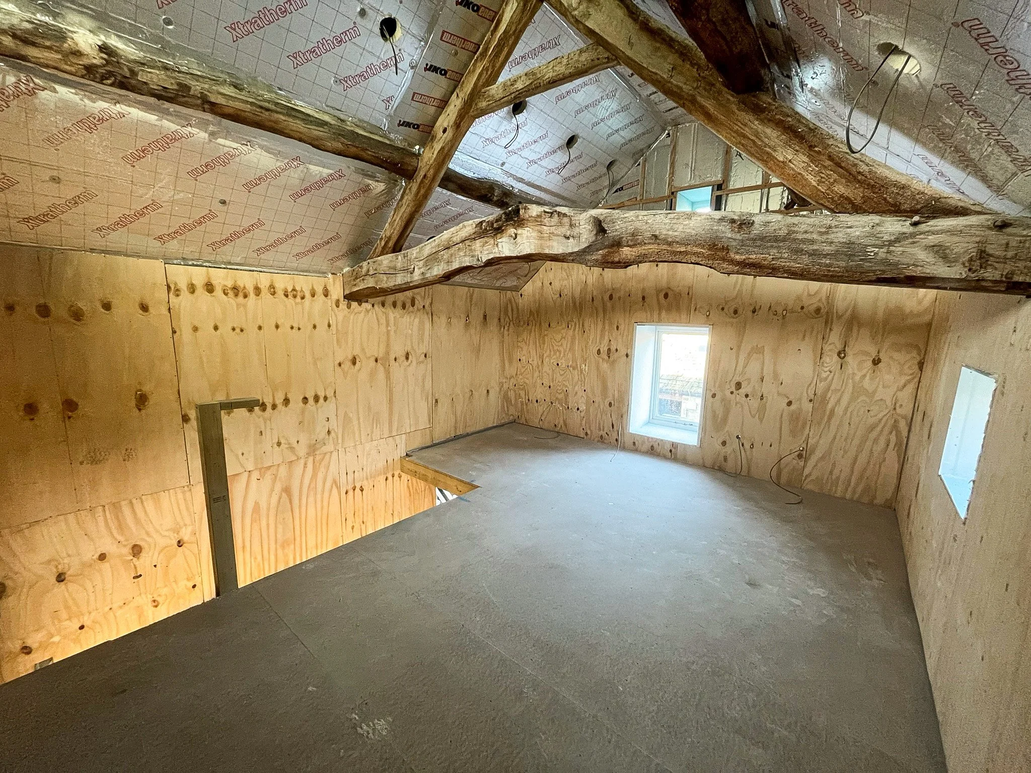 Office interior created within the converted historic stone barn.