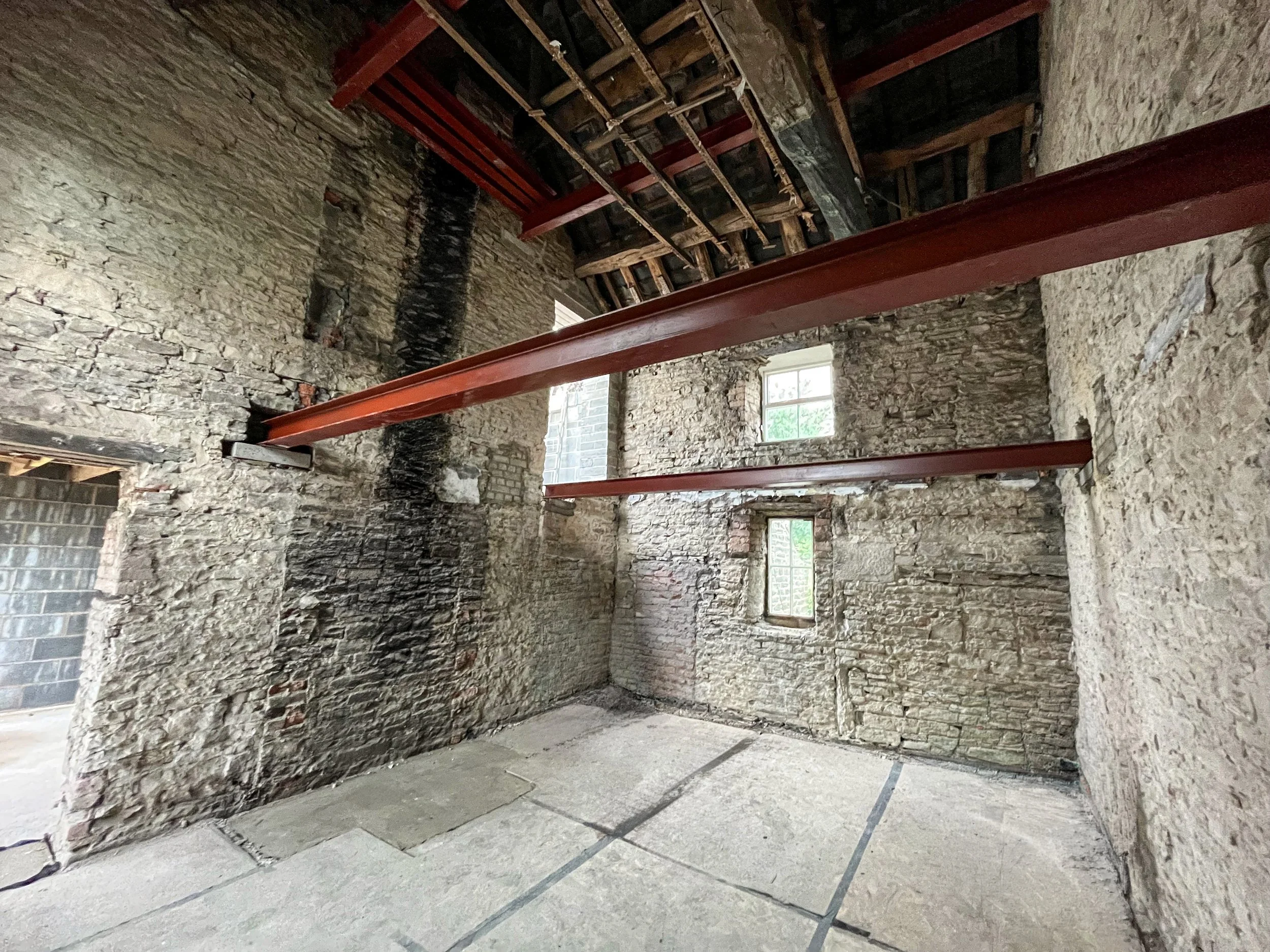 Structural steel beam installation carried out during major internal alterations.