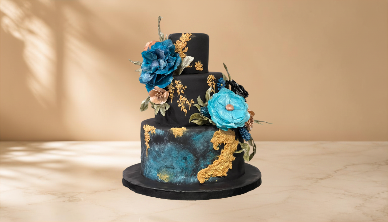black and blue 3 tier cake.png