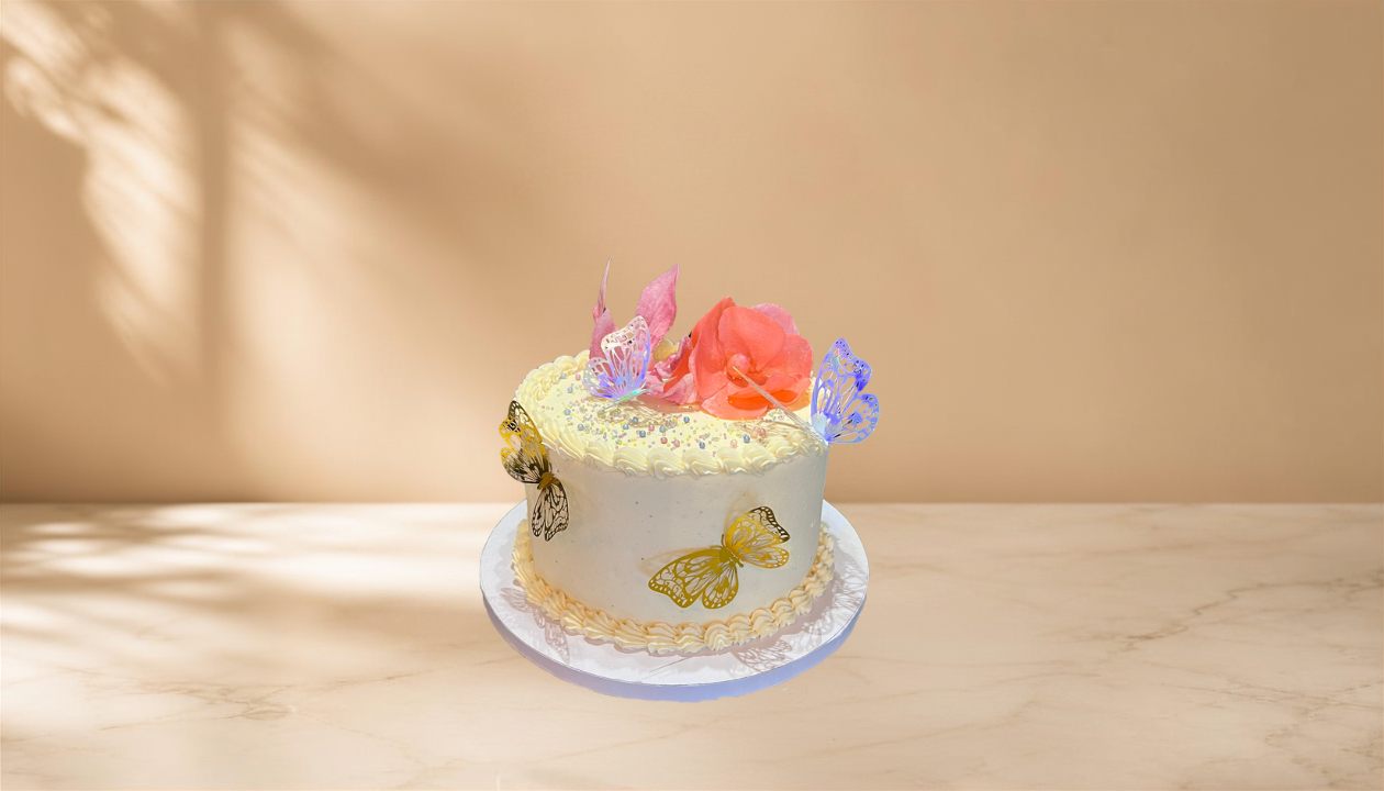 Buttercream butterfly cake with piped flower