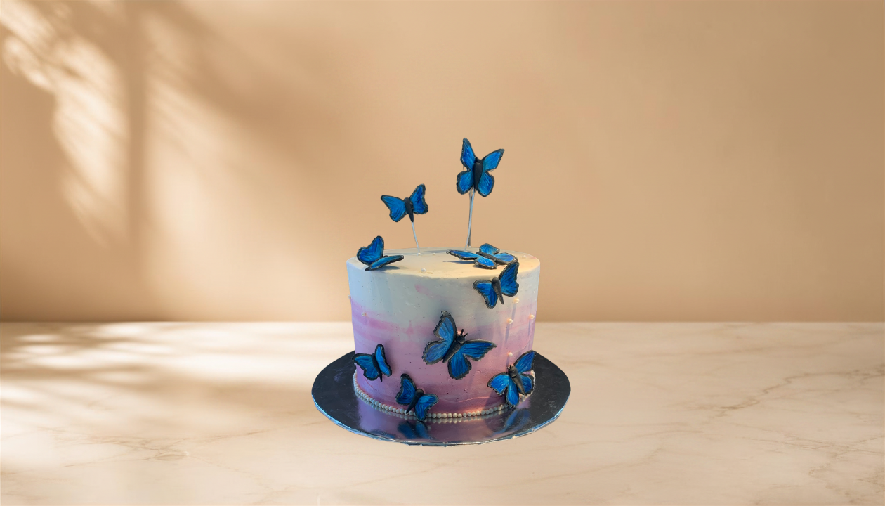 1 tier cake with handmade butterflies.png