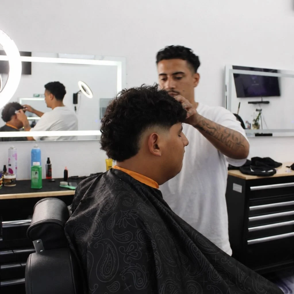 @nikk.kutz in action 📸 click the link on our bio to book a cut with him or call the shop ☎️(805)-253-0599