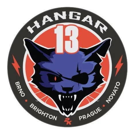 Design featuring a black panther with an eye patch, the number 13 above it, and the word 'HANGAR' at the top, with location names Brighton, Prague, and Novato around the circle.