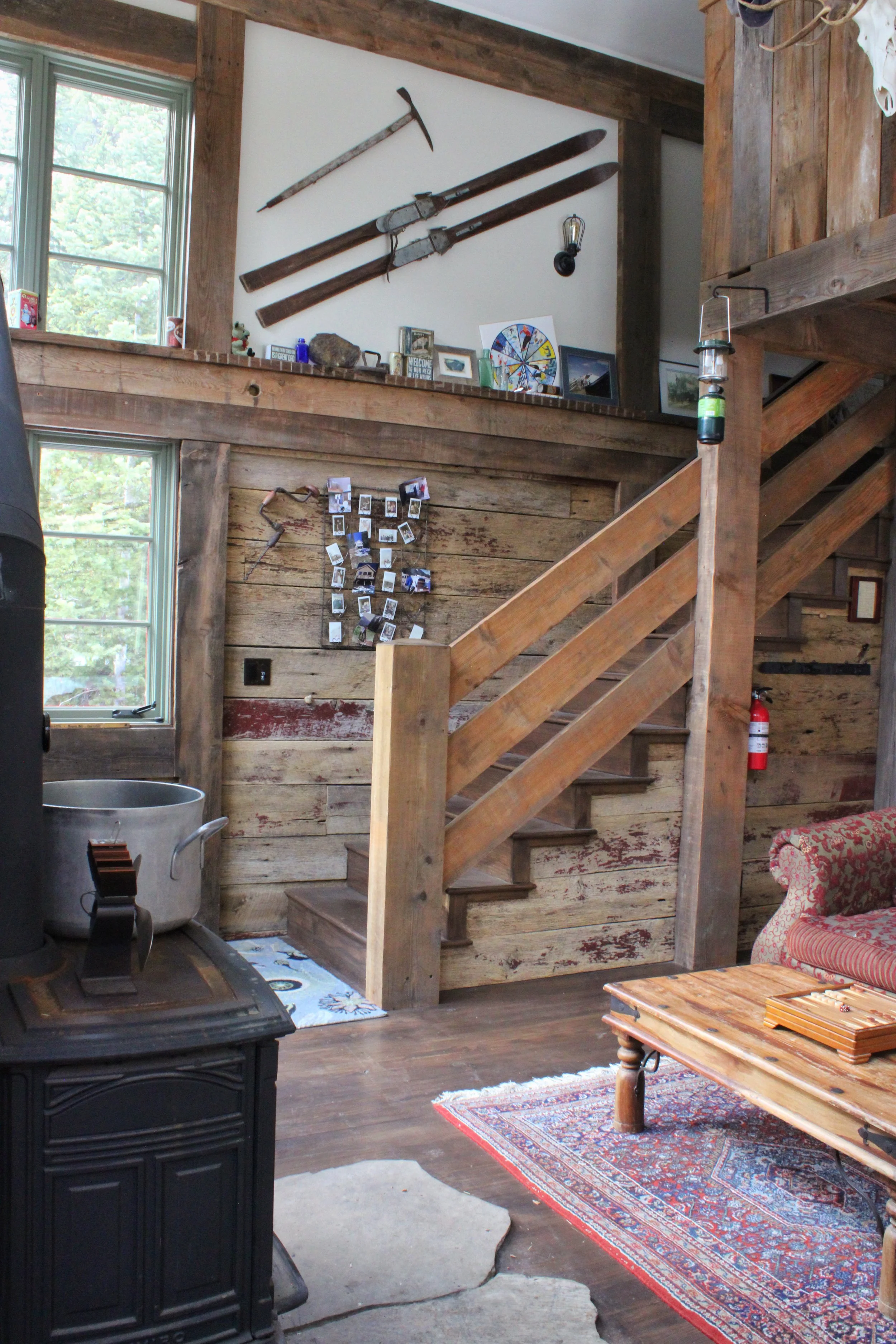 Living room, fire place, and stairs to bedrooms