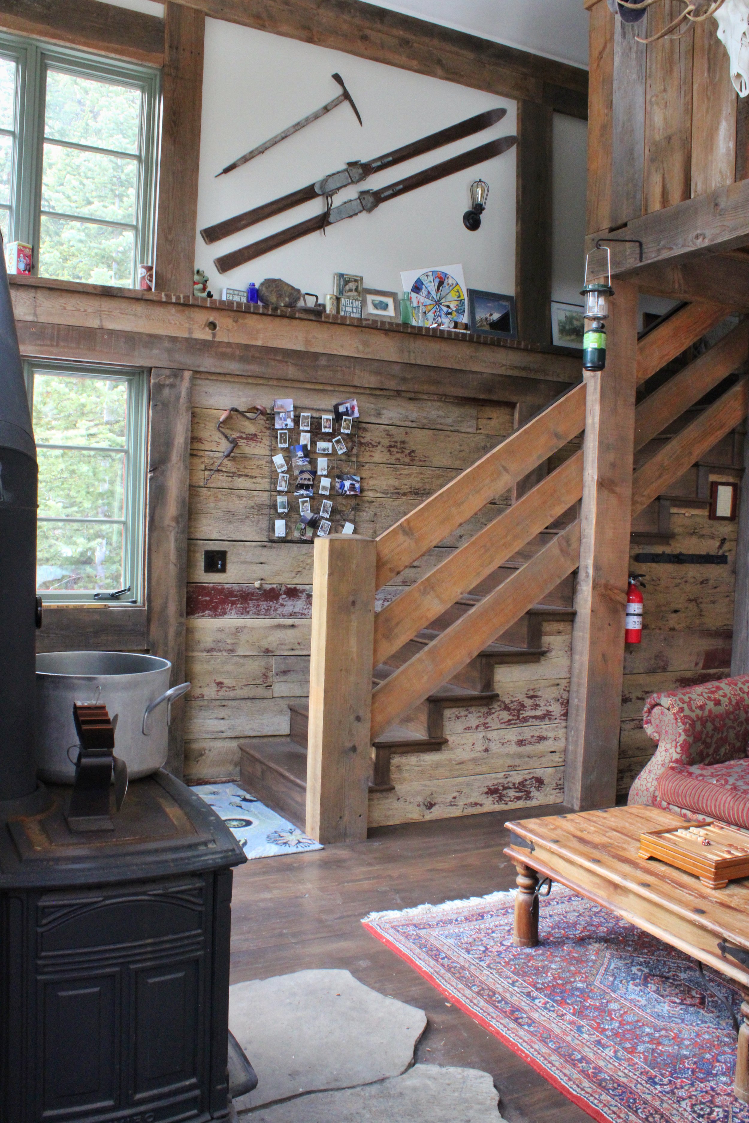 Living room, fire place, and stairs to bedrooms