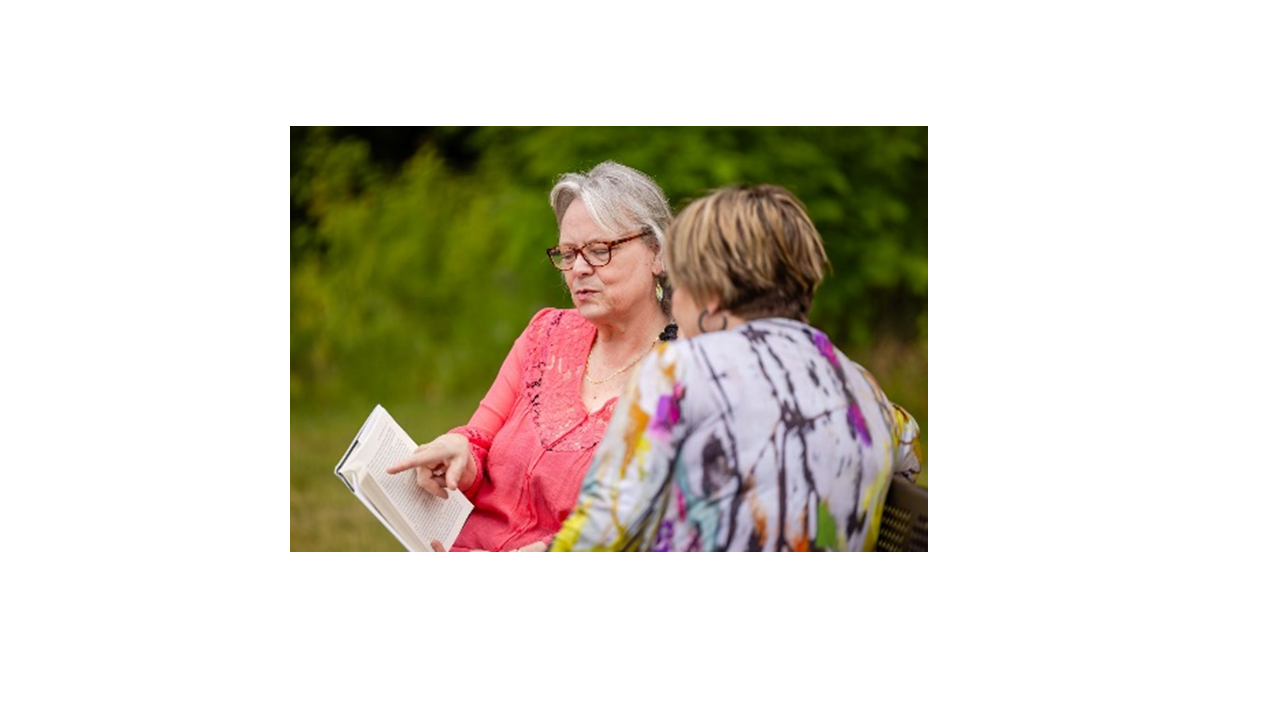 Sissel Bridges coaching a midlife woman using the Modern Viking Woman blueprint — a Nordic wellness approach focused on resilience, grounding, and empowered midlife living.