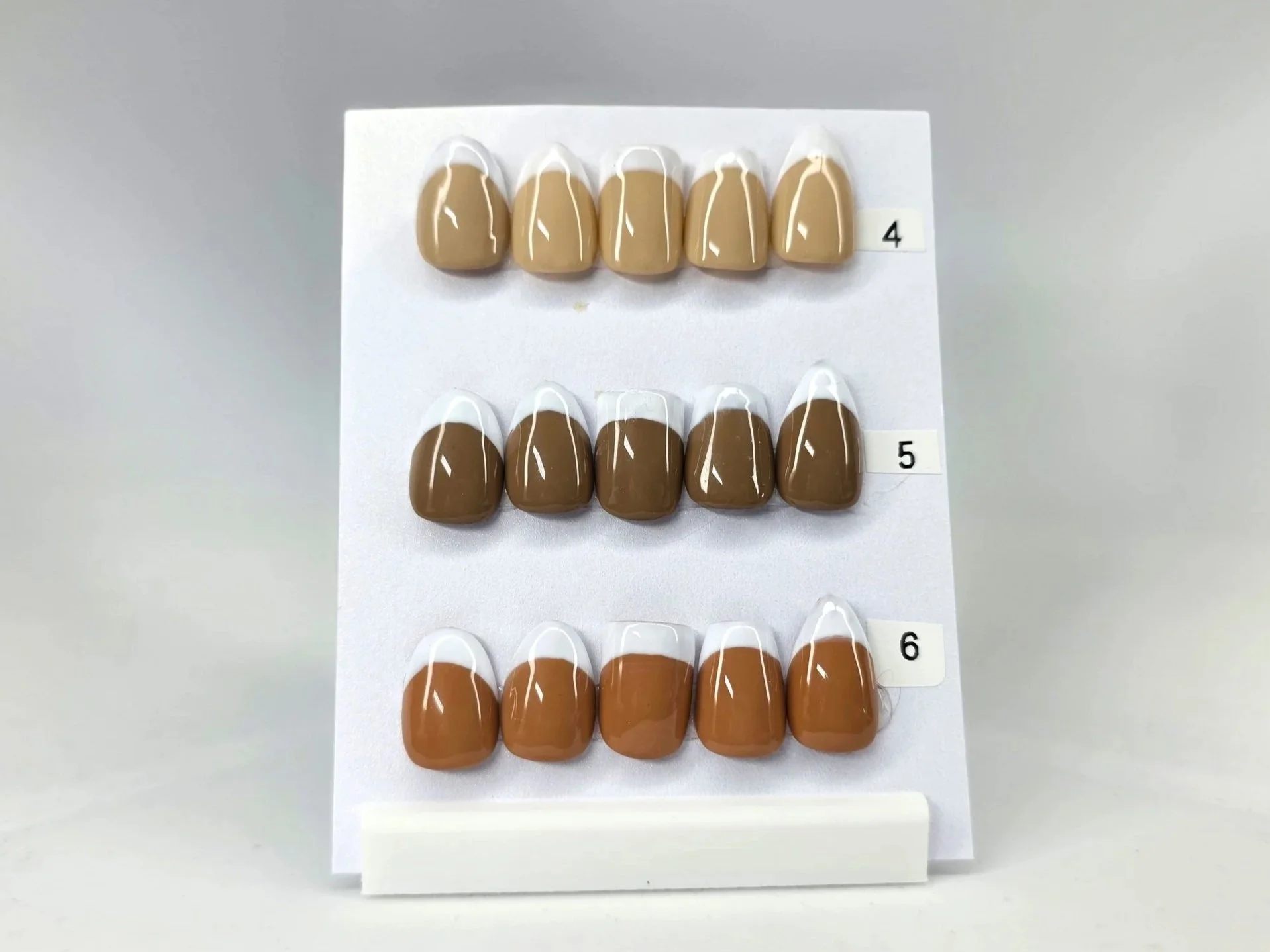 A display of nude skin tones for any nail designs that utilizes nude polish.