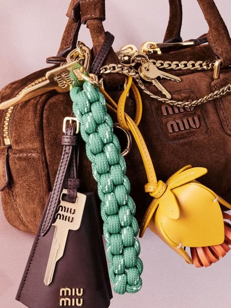 WHAT THE RETURN OF BAG CHARMS SAYS ABOUT OUR NEED FOR JOY IN FASHION