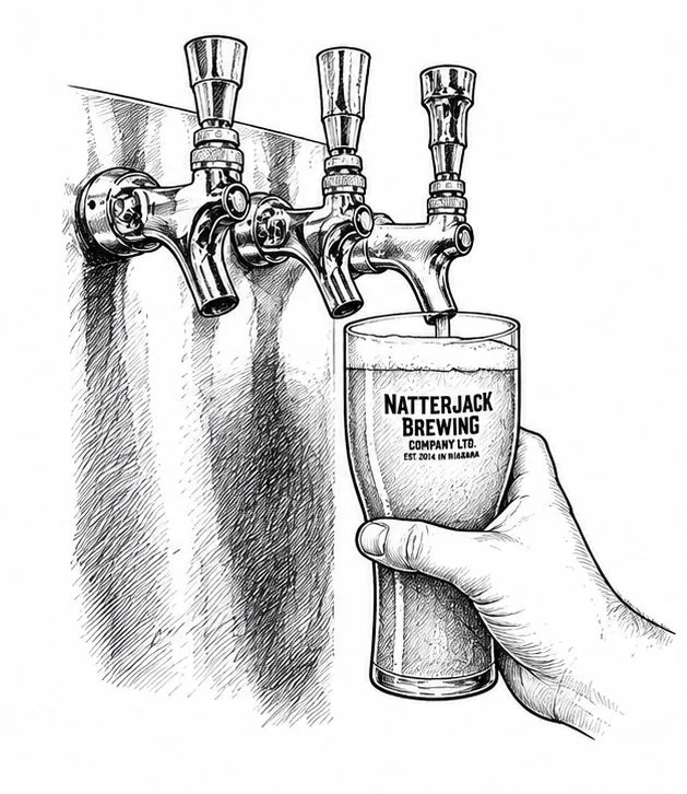 A hand filling a pint glass from a draft beer tap, with the glass labeled 'Natterjack Brewing Company Ltd. Est 2014 in Indiana'.
