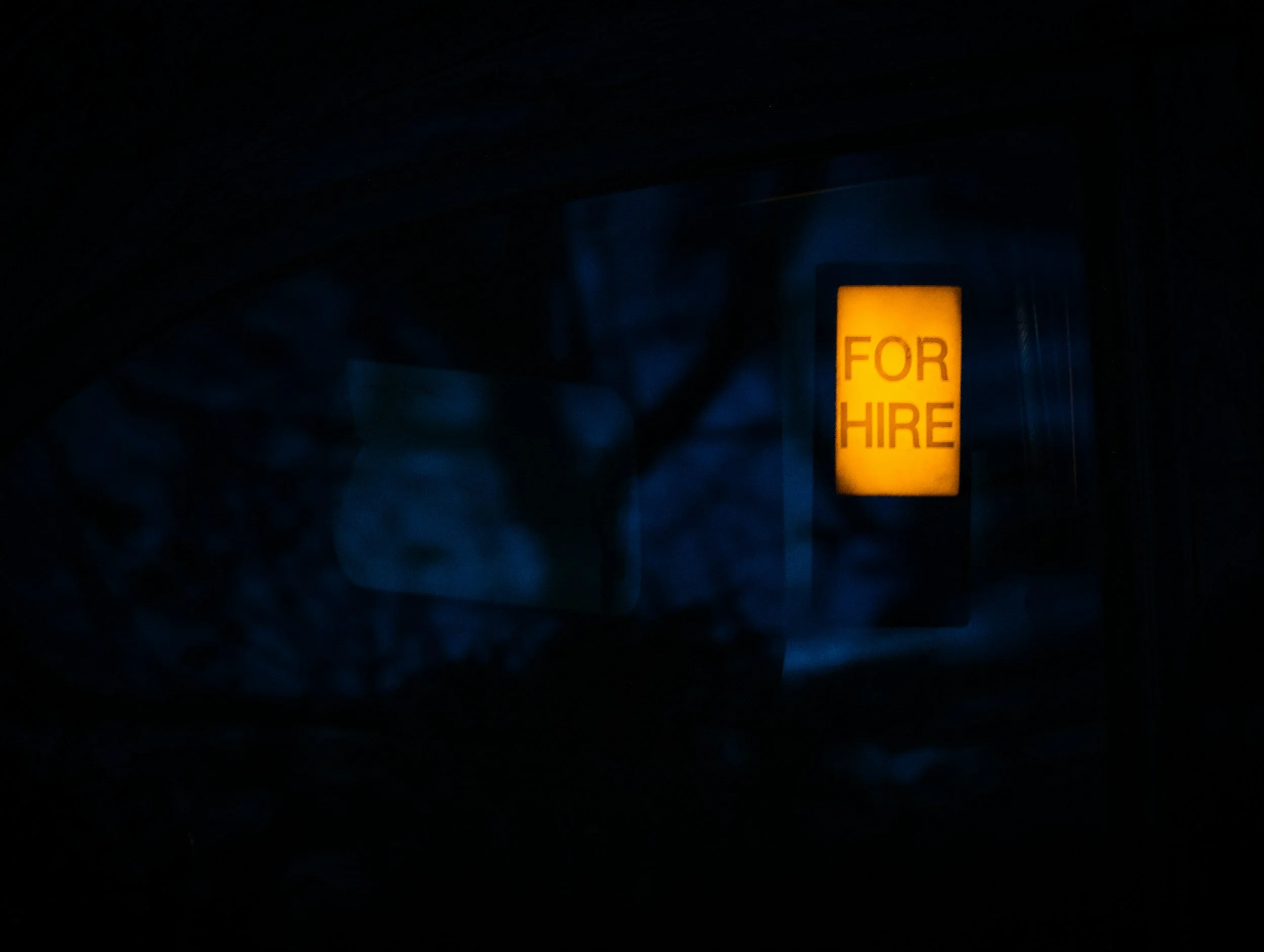 Glowing FOR HIRE sign symbolizing workforce planning and talent strategy.