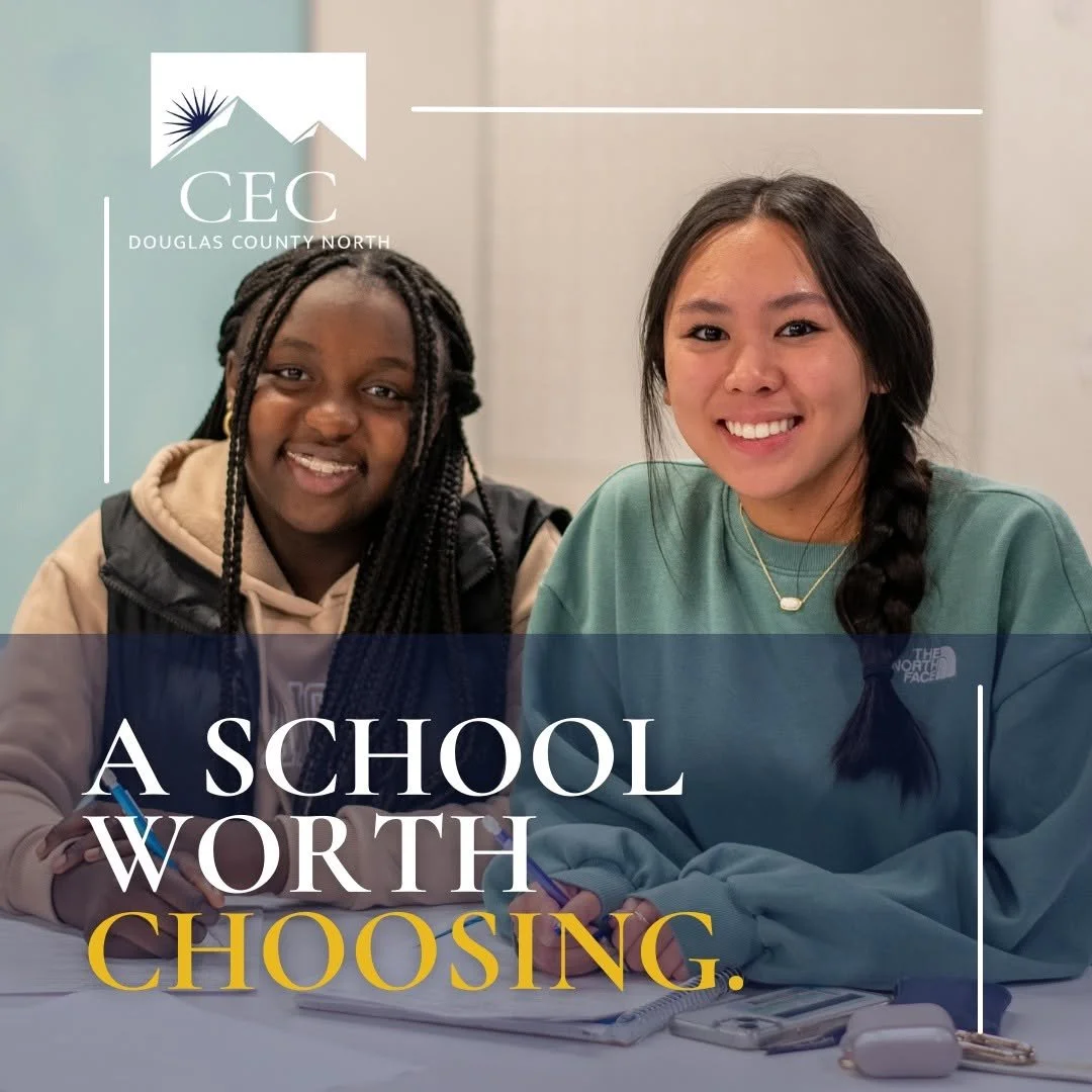Two smiling girls sitting at a table, with school supplies in front of them. The image includes a logo for Douglas County North and text that reads 'A school worth choosing.'