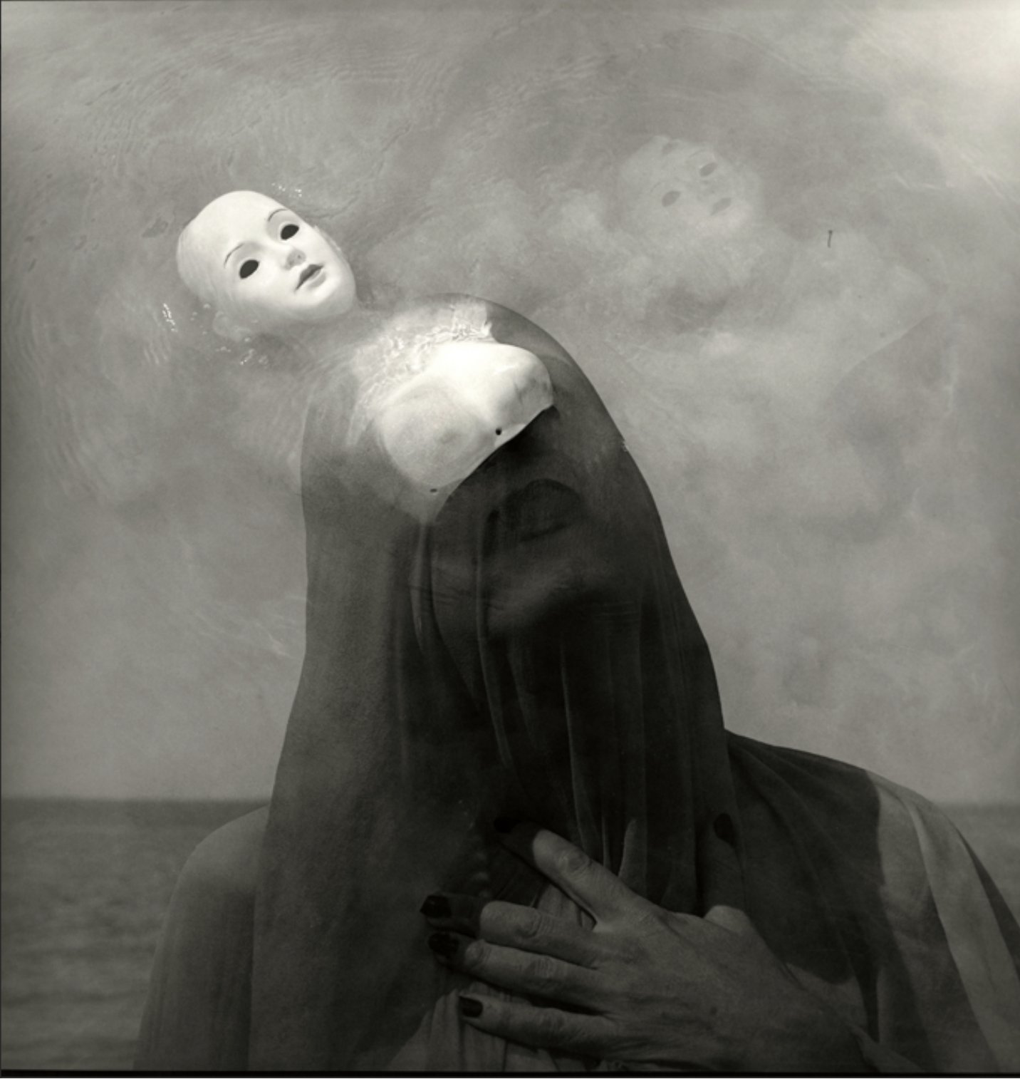 A person lying on the ground in a state that resembles a pose from a classic painting, with their hand on their chest, and their gaze directed upward, with their face and chest illuminated.