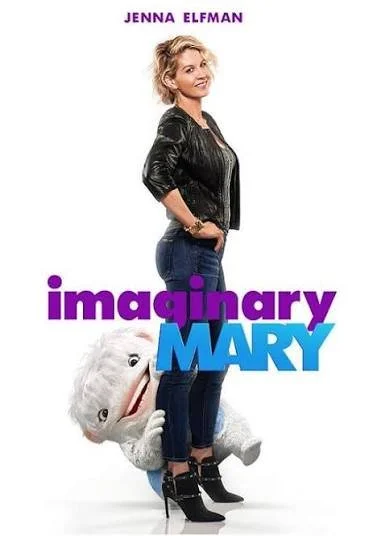 Movie poster for "Imaginay Mary" featuring Jenna Elfman standing with a friendly smile, wearing a black jacket and jeans. A puppet or puppet-like character with white hair and a big smile is positioned at her feet.