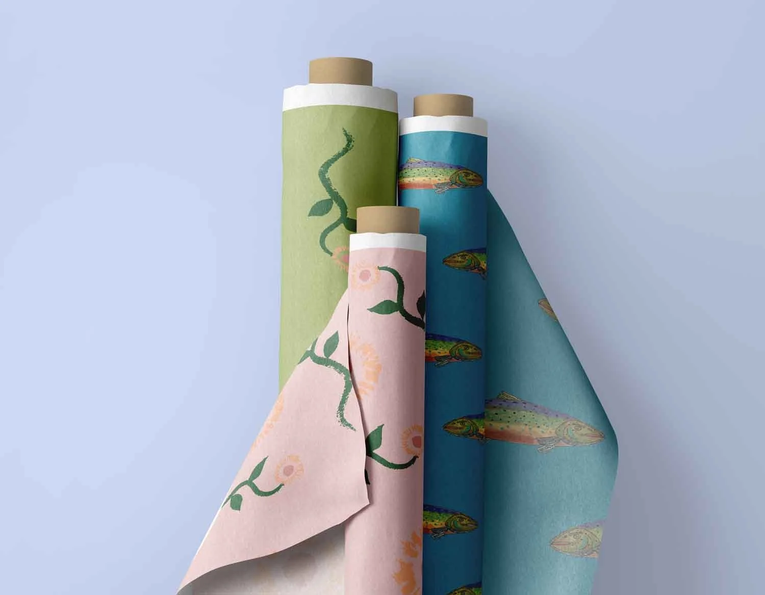 Three nature-inspired designs on fabric rolls by artist Studio Victoria Louise.