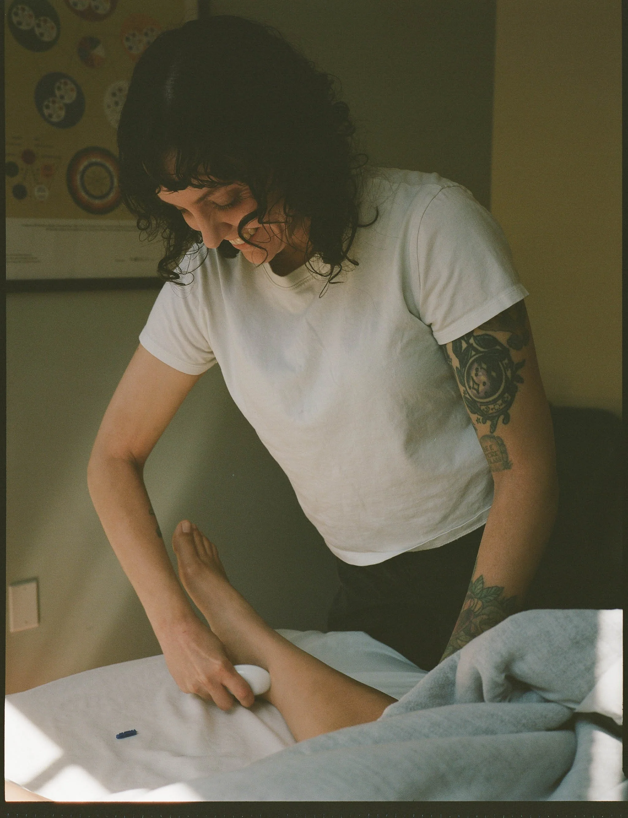 Portland acupuncturist Brooke Cannon Scott in consultation with a patient, providing trauma-informed classical Chinese medicine for CPTSD, grief, addiction, traumatic brain injury, preconception, pregnancy, postpartum, and complex chronic conditions.