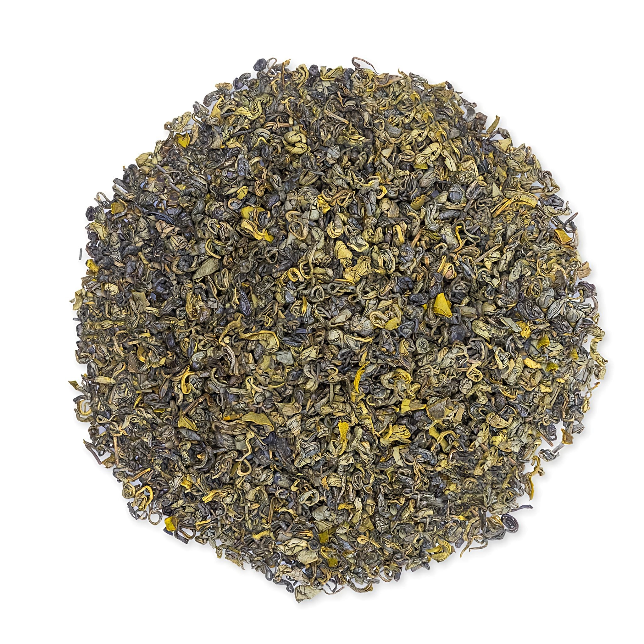 Close-up of a large, round pile of dried green tea leaves and jasmine flower petals.