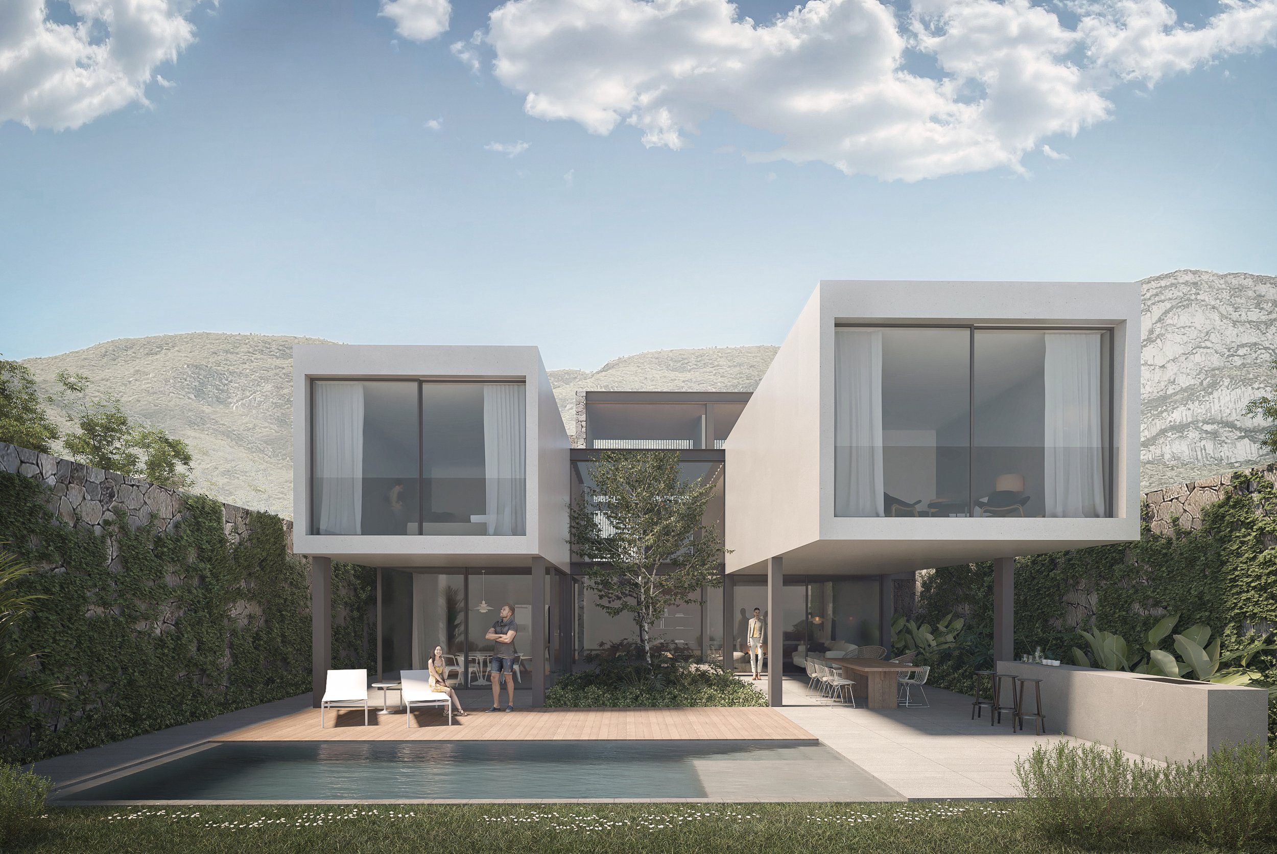 Modern white house with large glass windows and sliding doors, set against a mountainous backdrop. There is a patio with outdoor furniture, including lounge chairs and a dining table. A pool is visible in the foreground, with a man and youth near the