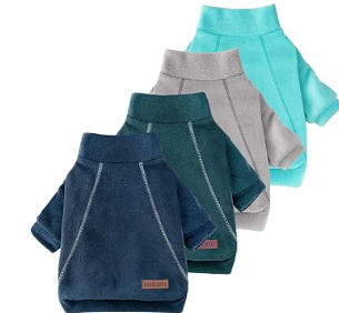 Four dog sweaters in blue, dark green, gray, and light blue, arranged in a row.