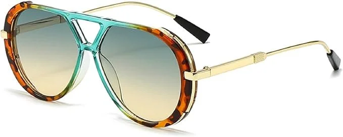 Sunglasses with tortoise shell and gold frame, gradient lenses, and black tips on the arms.
