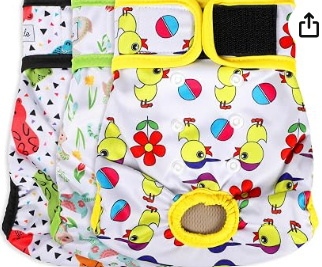 A collection of colorful baby cloth diapers with various patterns, including ducks, flowers, and geometric shapes.