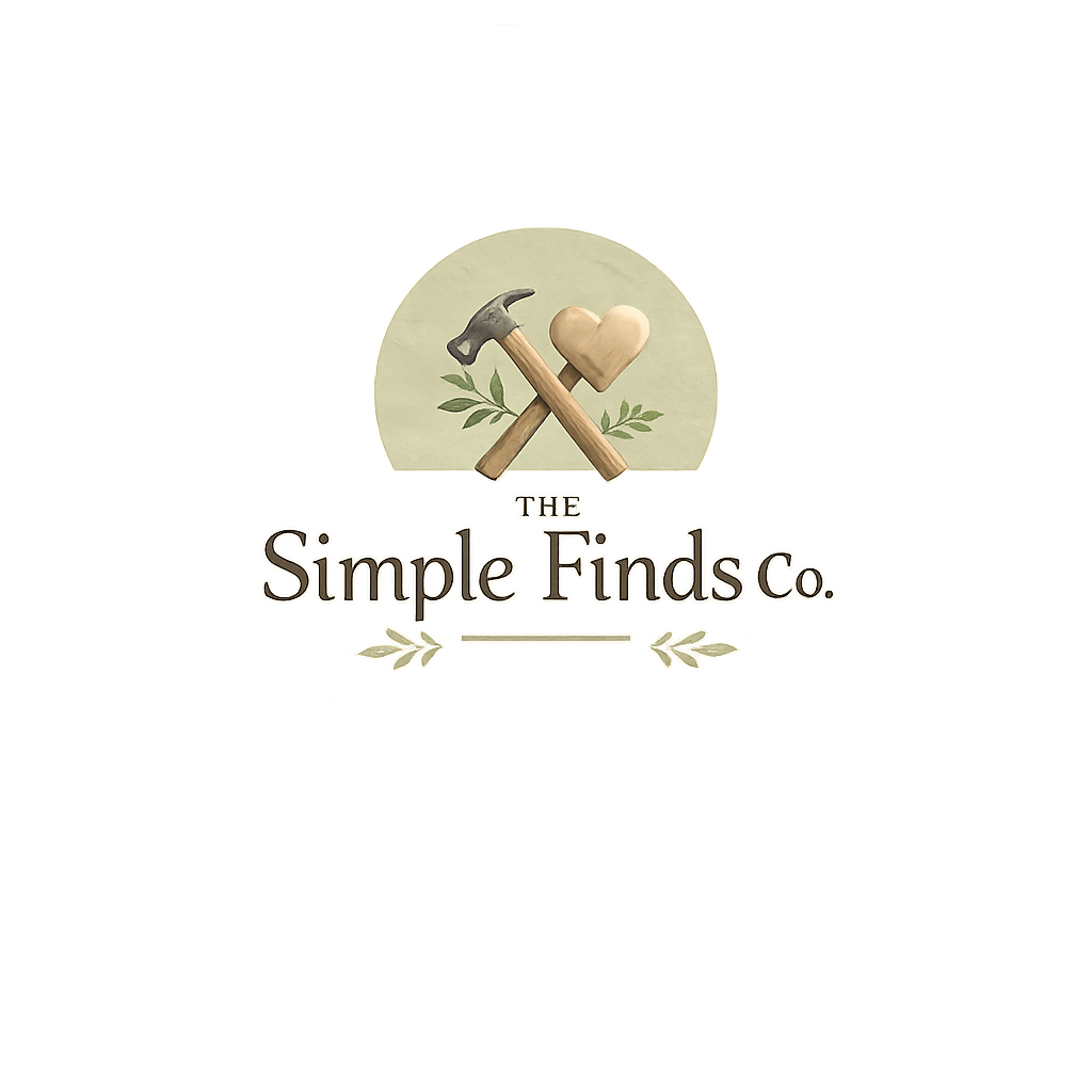 Logo for The Simple Finds Co. featuring a hammer, a heart, and olive branches on a light background.