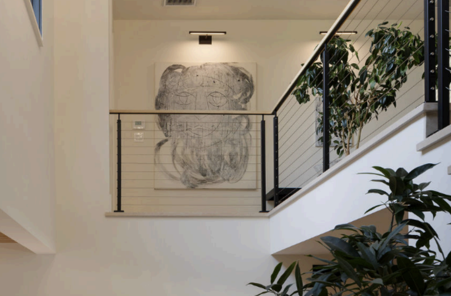 Luxury art staging in Los Angeles featuring museum-quality contemporary artwork in a modern luxury residence.
