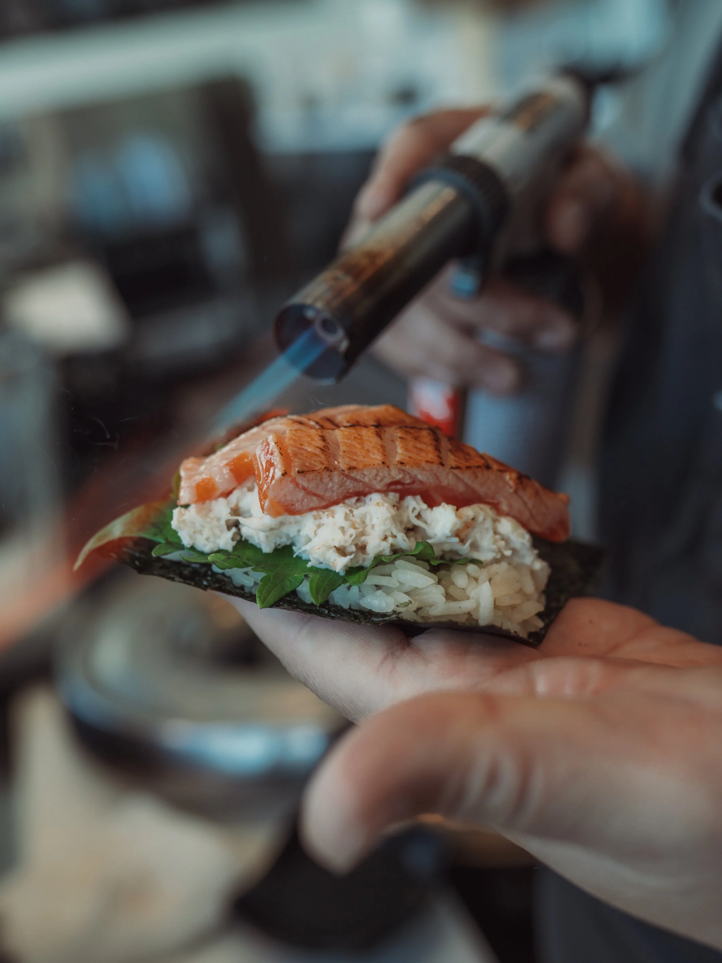 SLAMMIN&rsquo; SALMON 🔥
torched crab &amp; steelhead, shiso, spicy eel sauce, pickles, rice crackers 

#salmon #steelhead #handrollsushi #dryagedfish