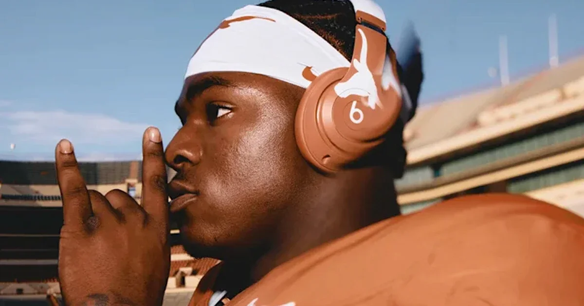 A person wearing Beats By Dre headphones