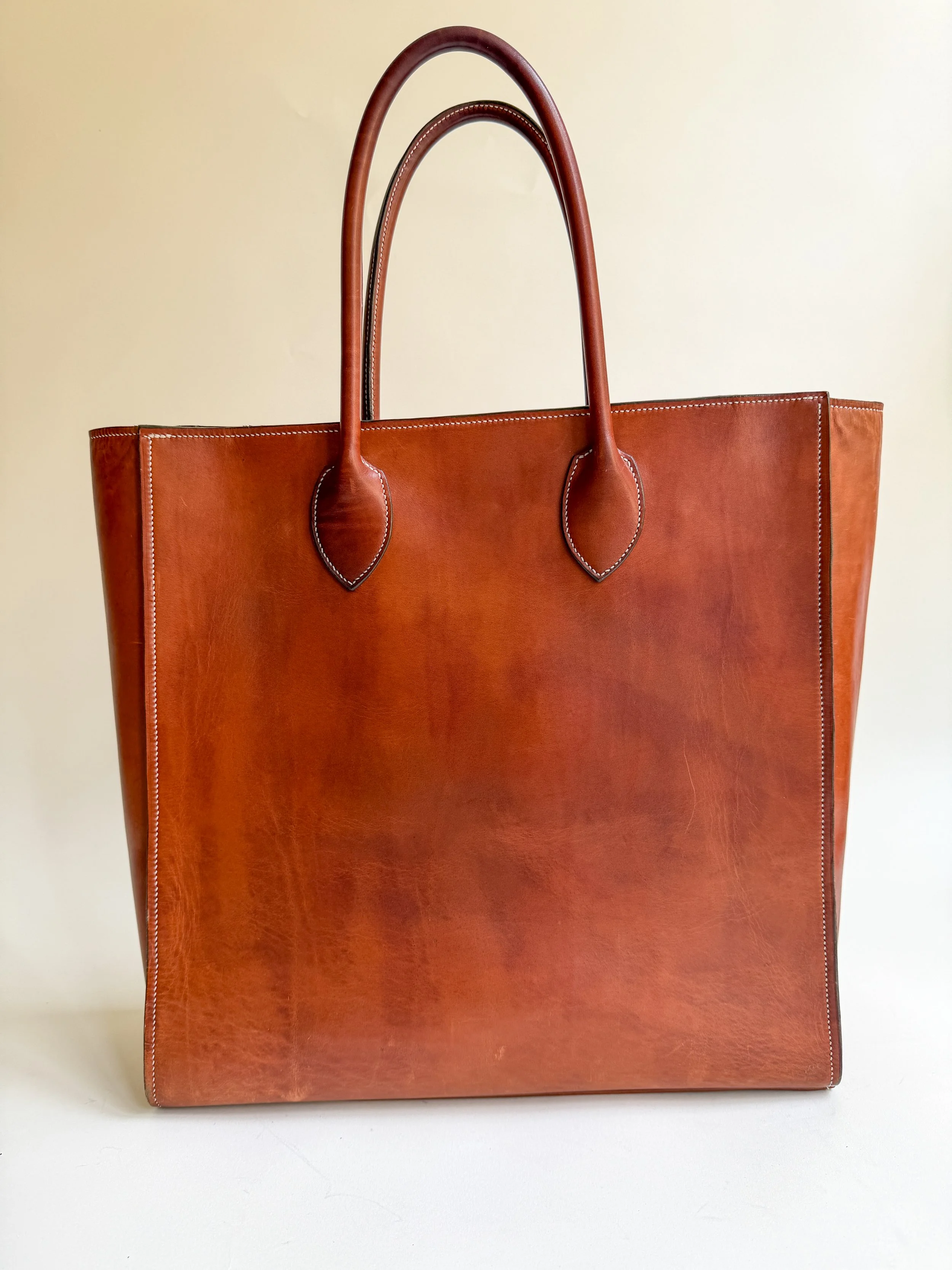 - Box Calf Leather Exterior

- Box Calf Leather Interior

- Hand stitched with waxed linen thread