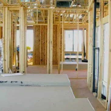 house framing with drywall board ready to be installed