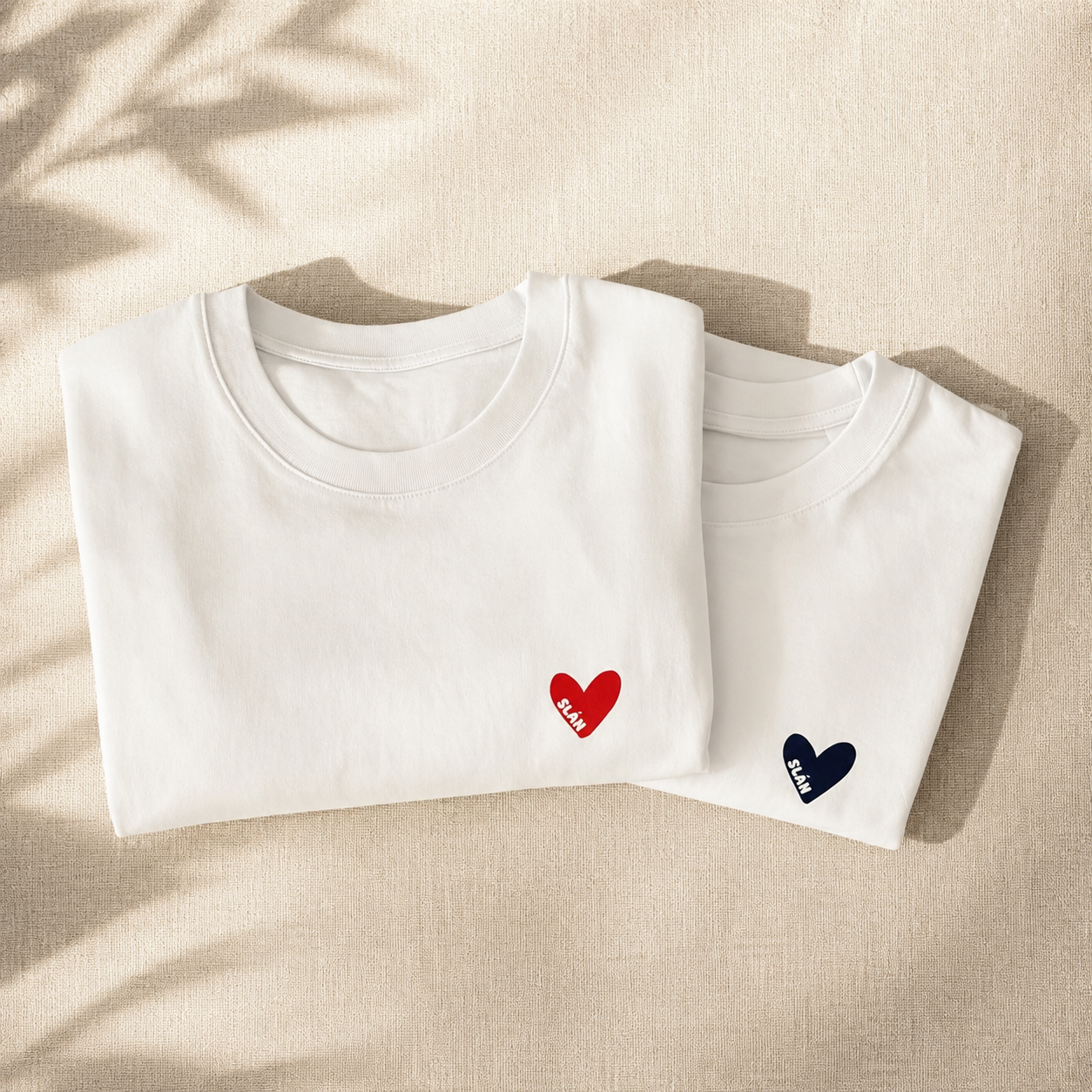 SLÁN Croí Tee white Irish language T-shirt with red and blue heart design