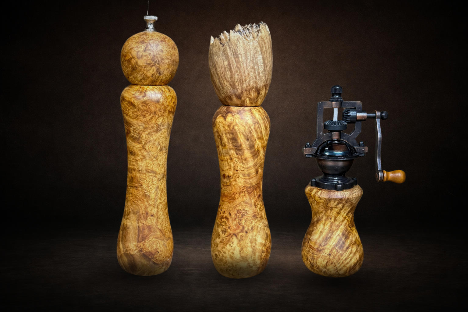 Amboyna burl peppermills of various styles
