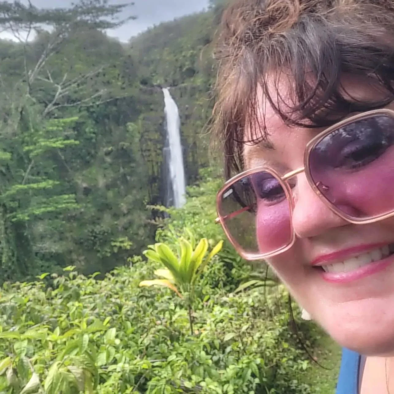 waterfall in the background Brandie in Hawaii