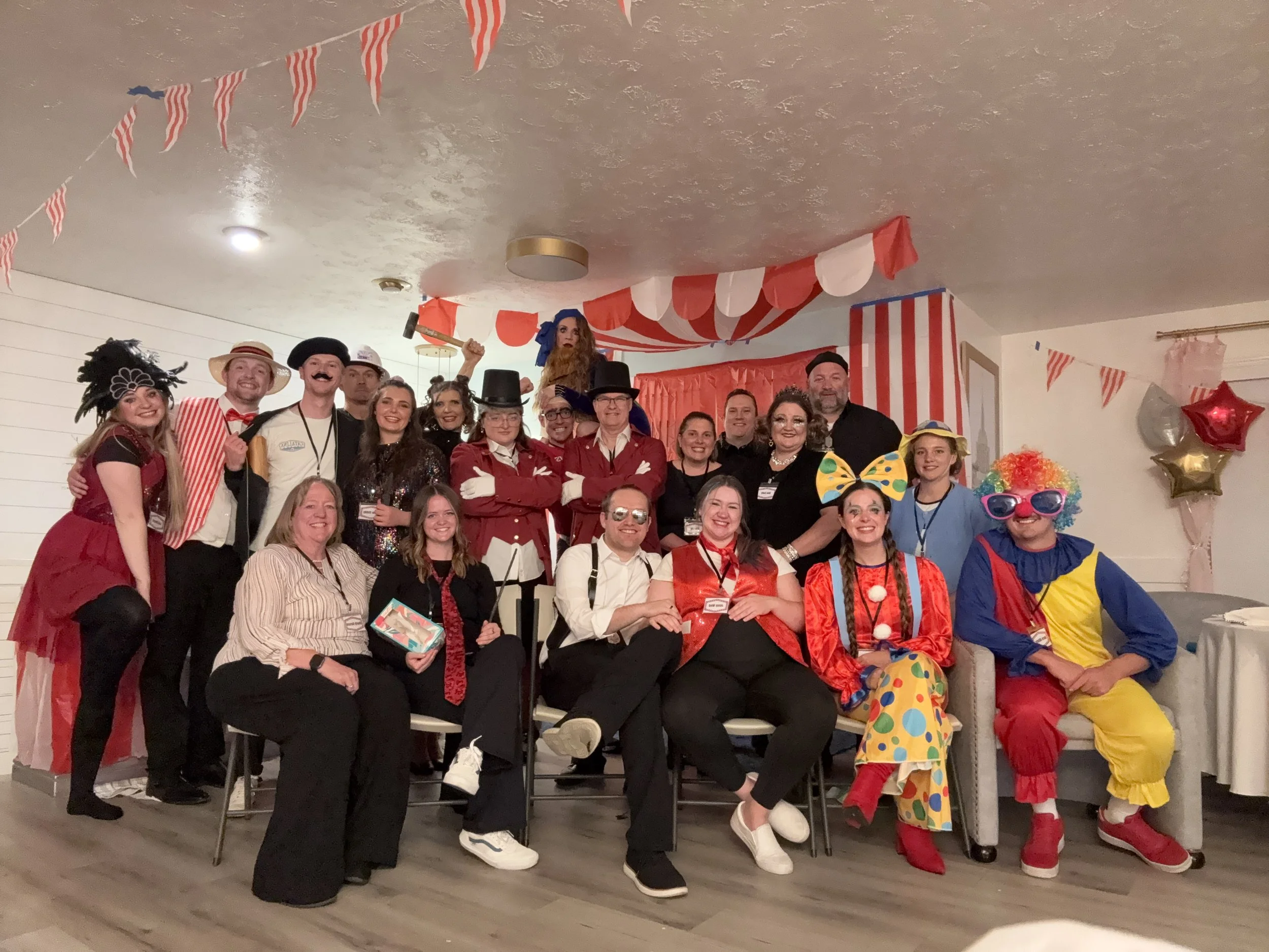 Blue Bee Counseling Carnival themed party a picture with everyone