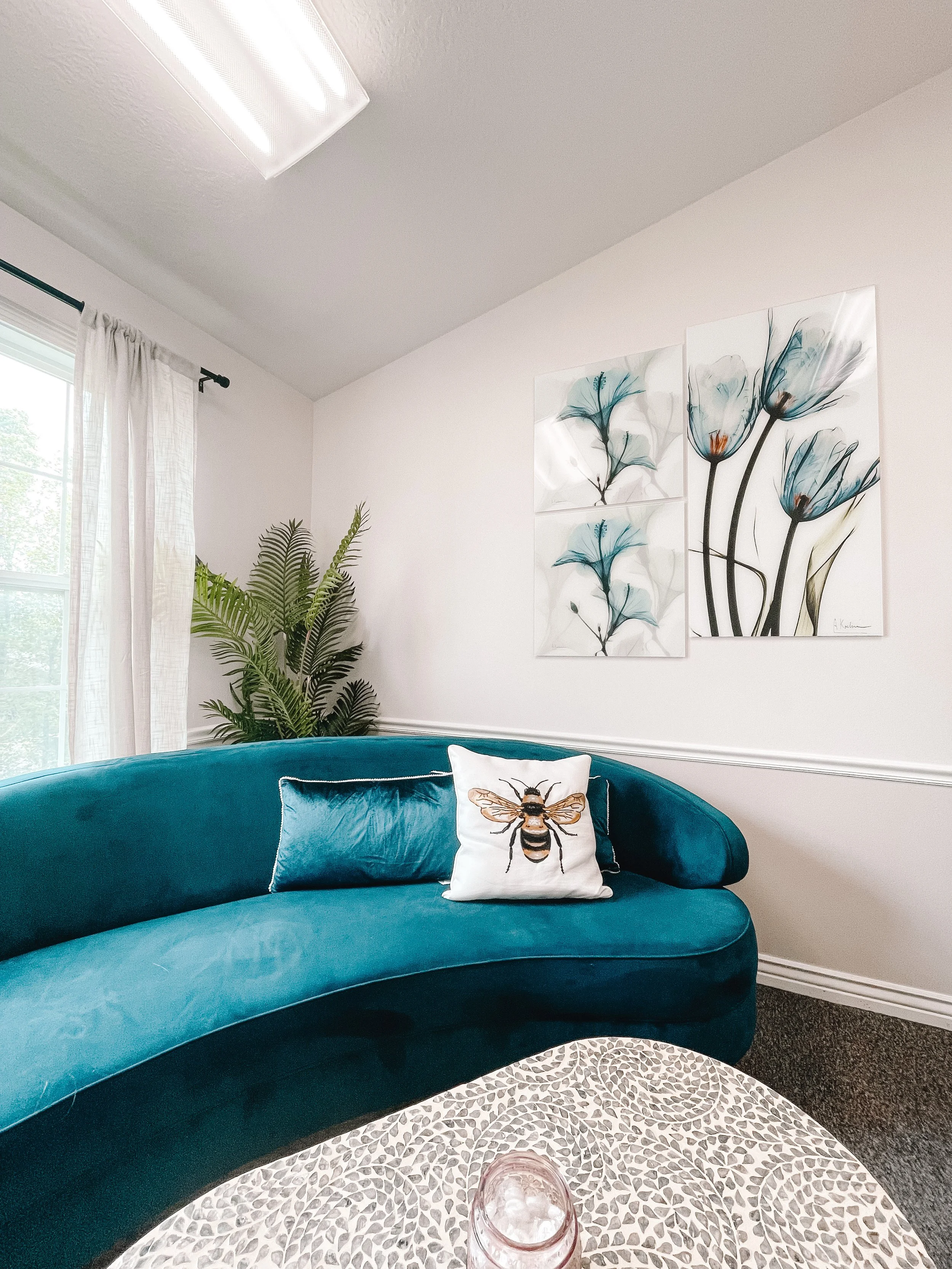 blue couch therapy office in South Jordan