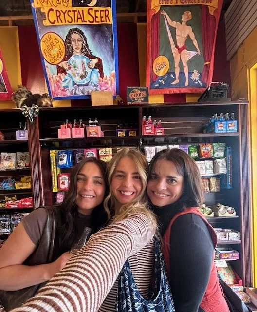 Photo with Andrea at store with daughters
