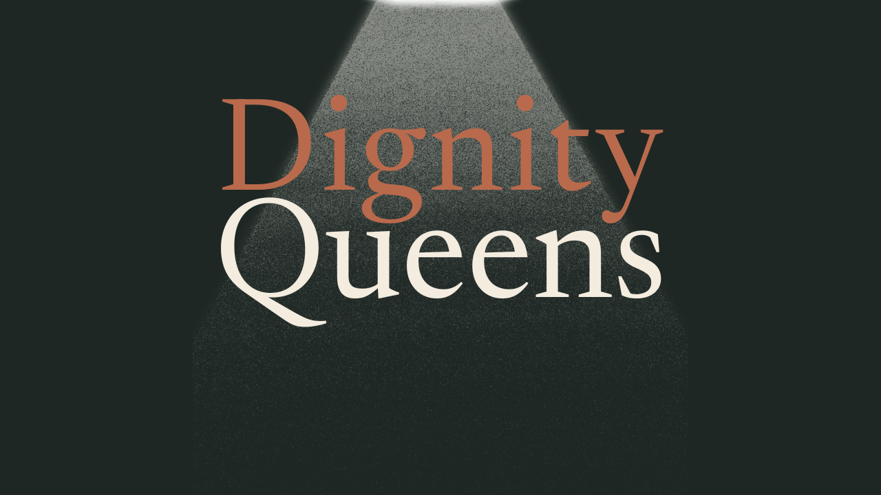 Text reading "Dignity Queens" illuminated by a spotlight against a dark background.