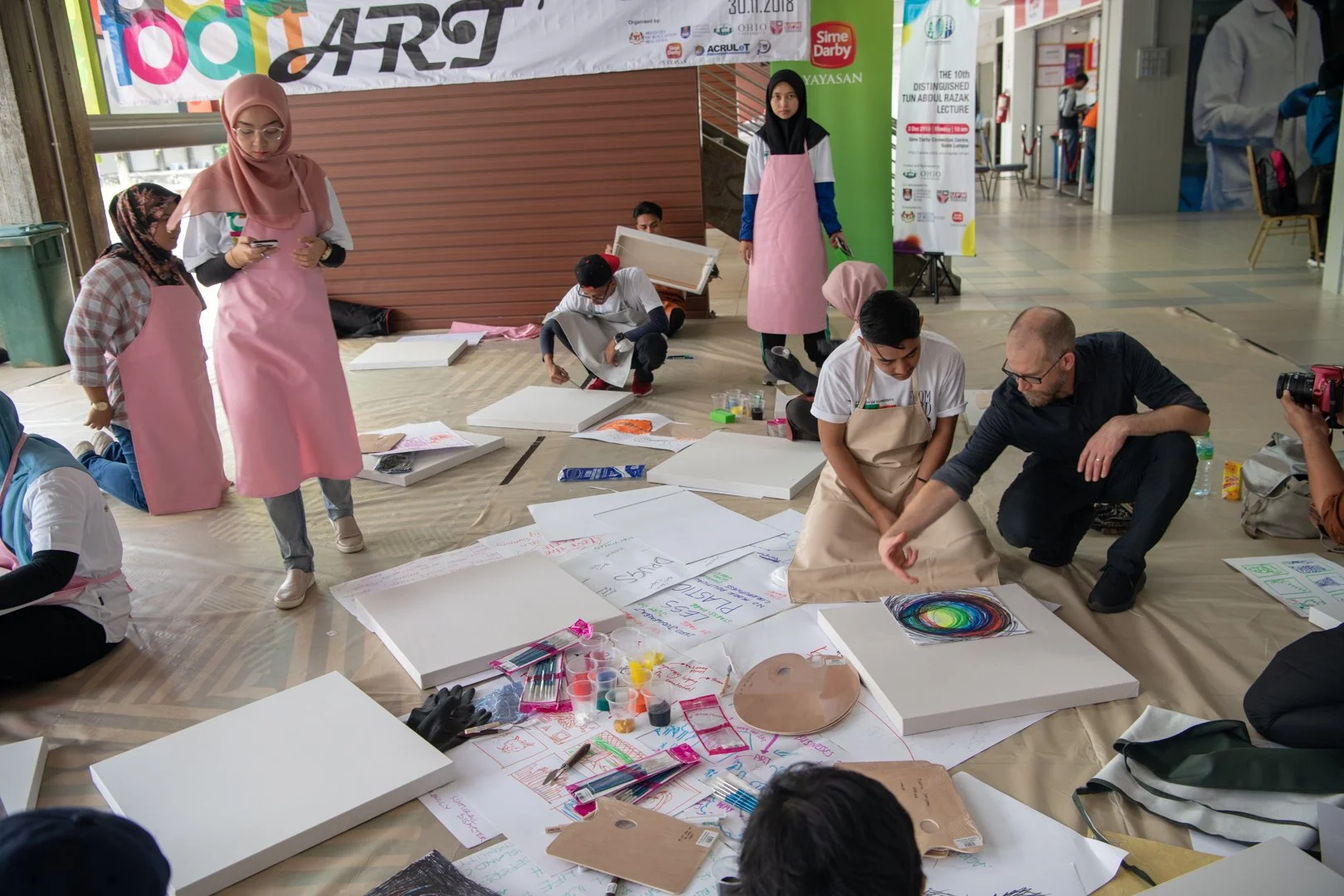 Acid 2 Art in Malaysia, with students making art