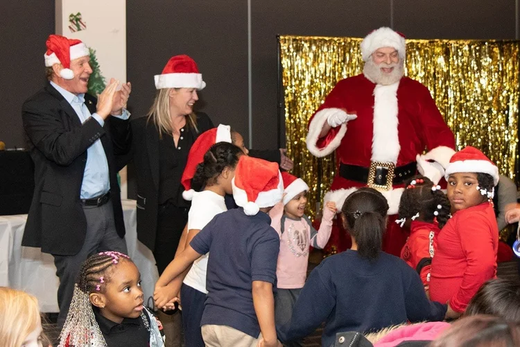 Children celebrating with Santa at Operation Santa