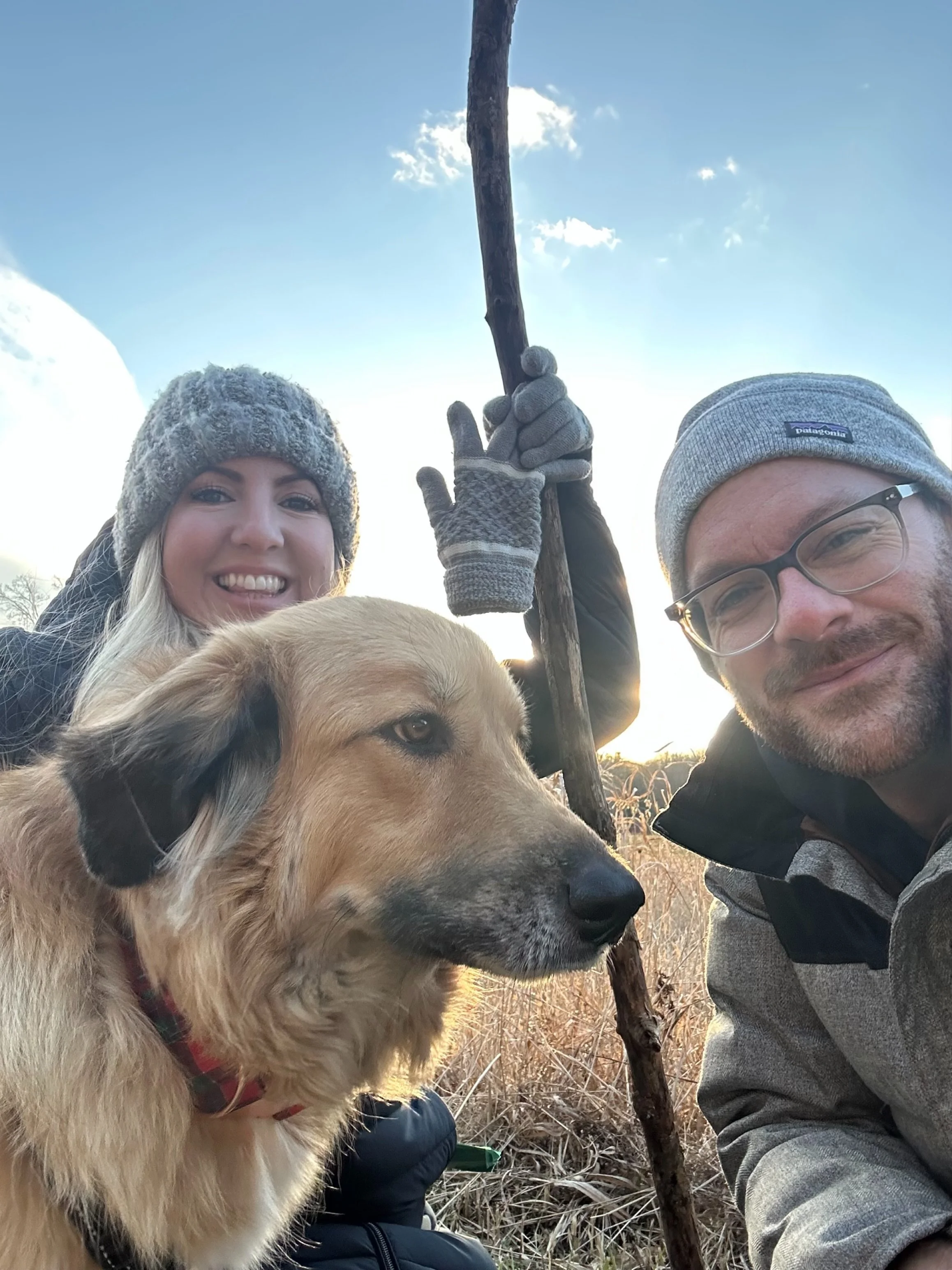 Jamie Dumaine-Russell outdoors in Connecticut with her dog